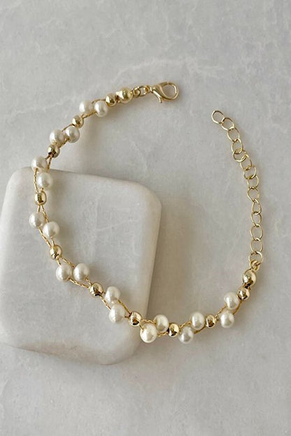 WRISTTE KADIN BİLEKLİK İNCİLİ TOP DETAY SARMAL BİLEKLİK