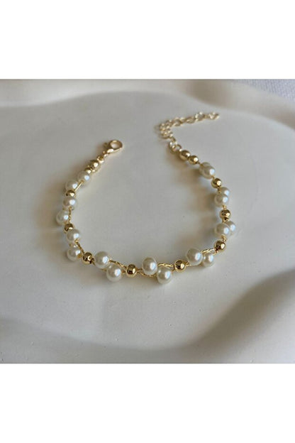 WRISTTE KADIN BİLEKLİK İNCİLİ TOP DETAY SARMAL BİLEKLİK