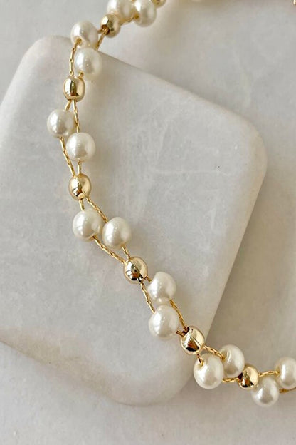 WRISTTE KADIN BİLEKLİK İNCİLİ TOP DETAY SARMAL BİLEKLİK